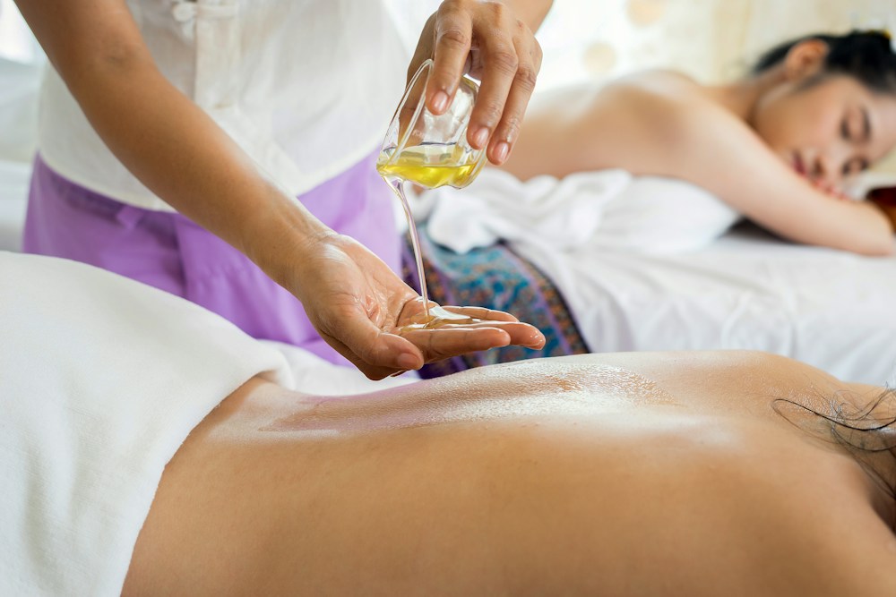 Therapist performing a body massage